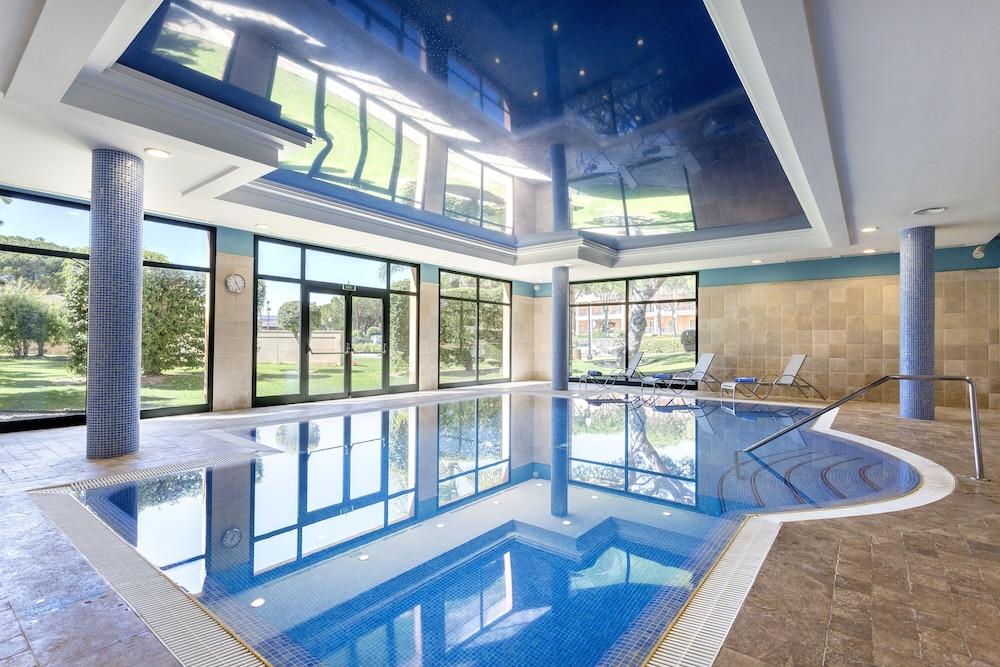 Hipotels Barrosa Palace & Spa Chiclana de la Frontera Bagian luar foto The swimming pool at the hotel