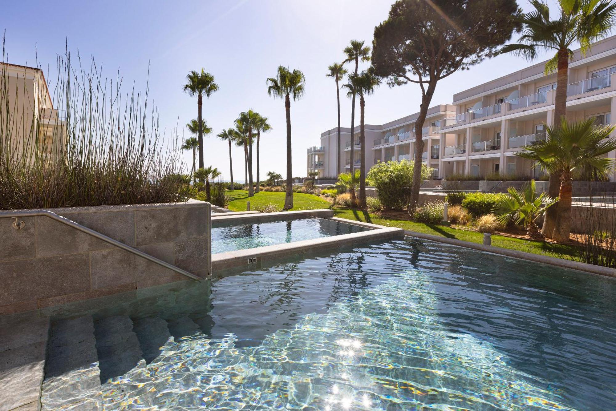Hipotels Barrosa Palace & Spa Chiclana de la Frontera Bagian luar foto The hotel's swimming pool